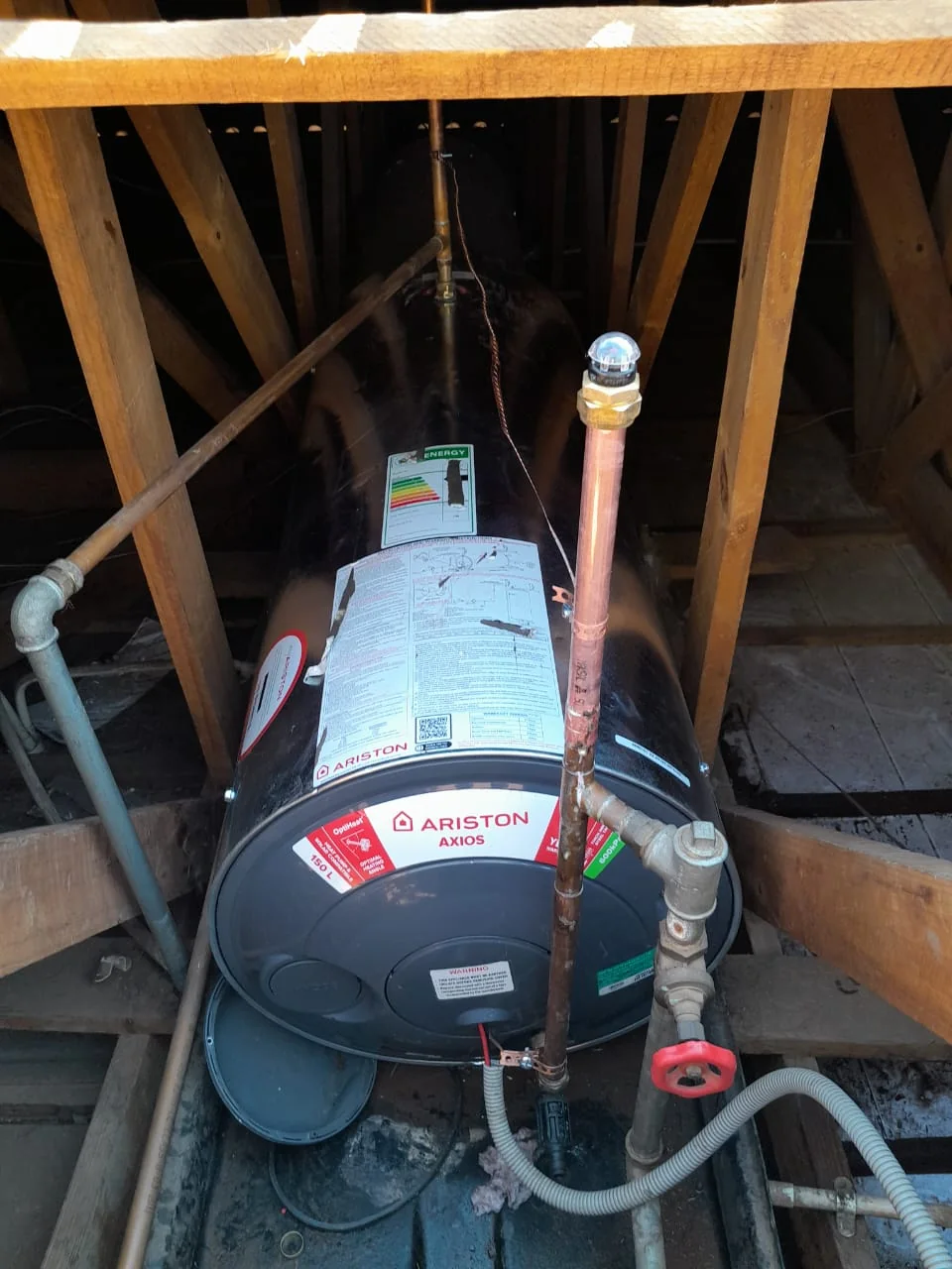 Electric geyser installation in a roof space