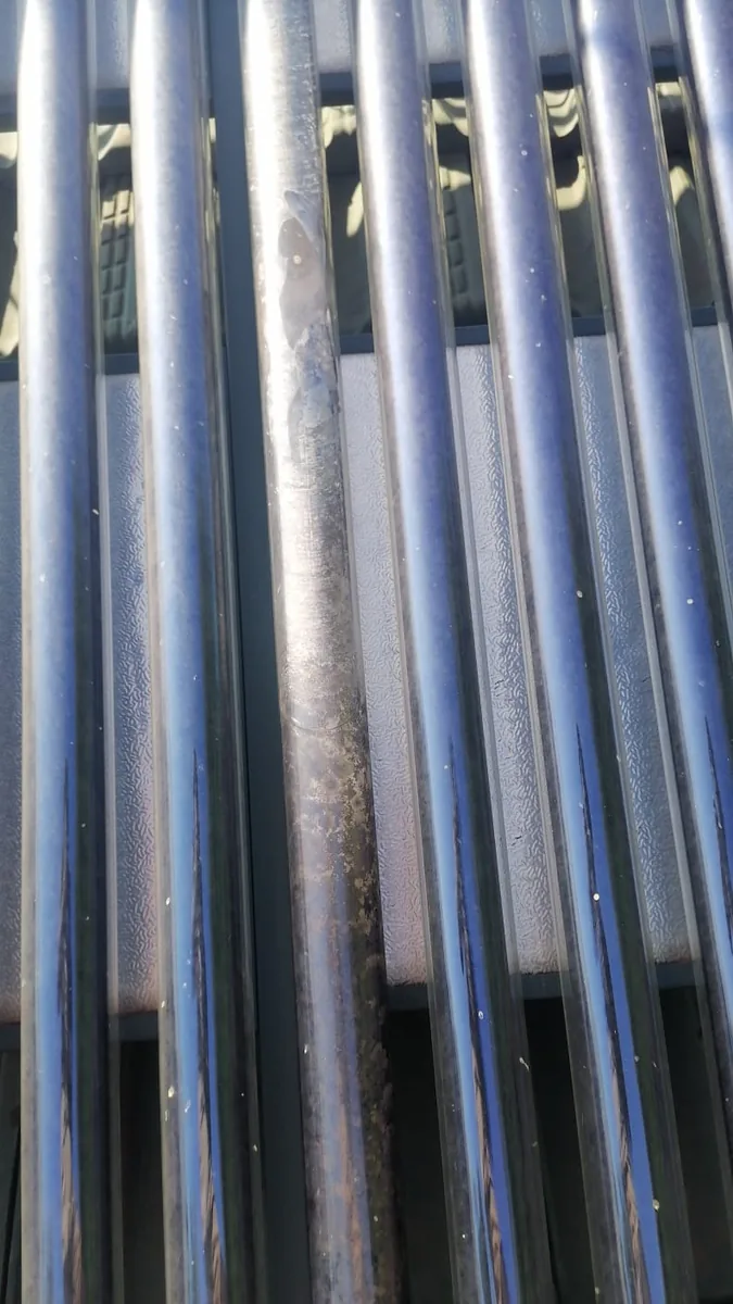 close view of evacuated solar tubes inspected by trusted solar geyser plumbers